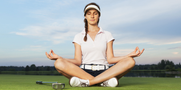 A Young Girl Get Relaxed Or Meditate With Golf Club And Ball In Golf Ground.